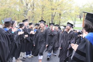 group of students wearing graduation cap and gown