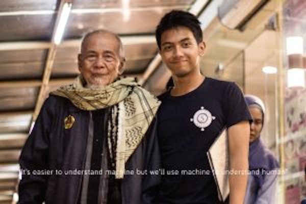 Winner Faza Hikmatulla posing with grandfather