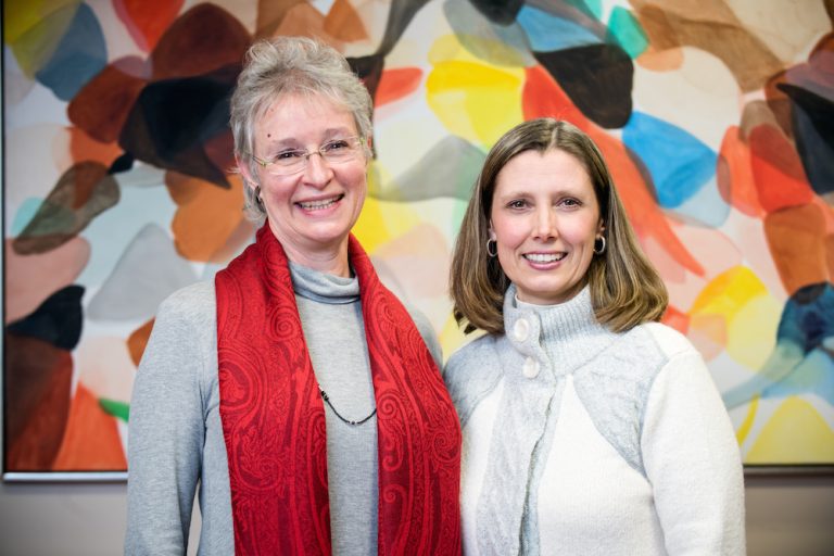 Marla Solomon (left) and Kerry Secrest (right) posing for photo