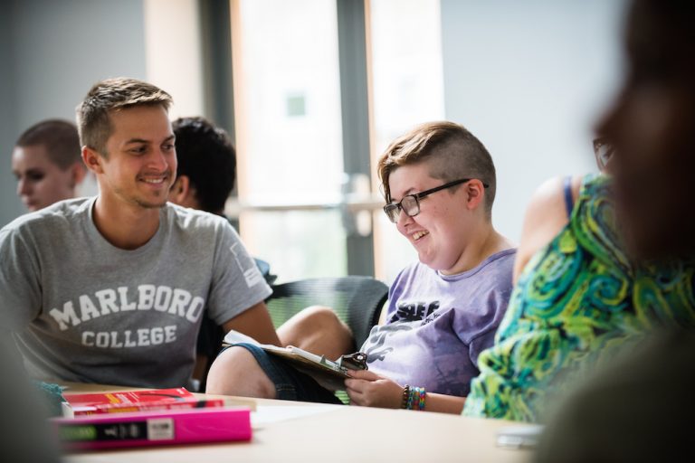 group of students talking and laughing