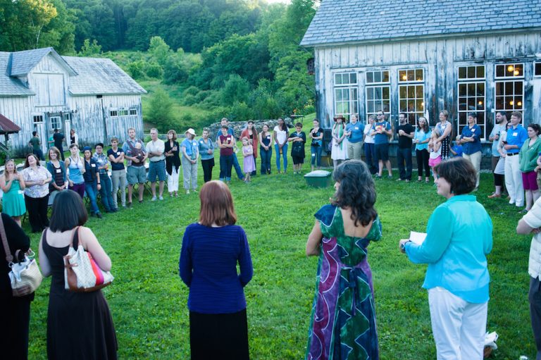 People gathered on a lawn for an event