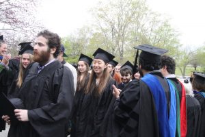 group of students wearing their graduation caps and gowns