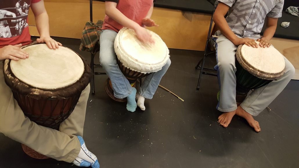 students playing the drums