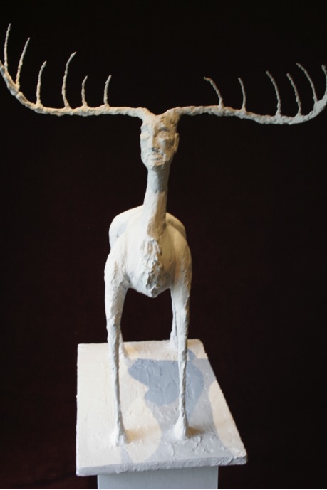 sculpture of a dear with antlers